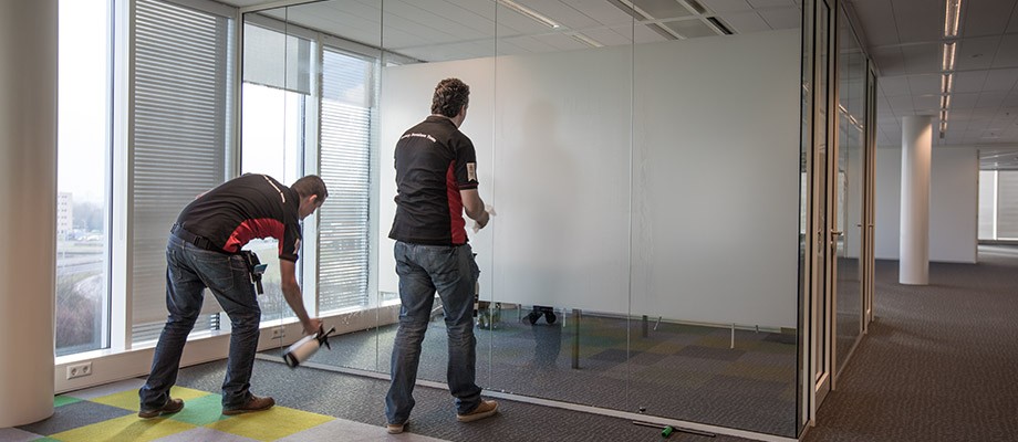 Installation of matte window film in an office
